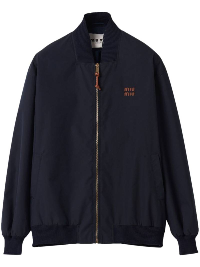 Miu Miu logo-patches bomber jacket - Blue von Miu Miu