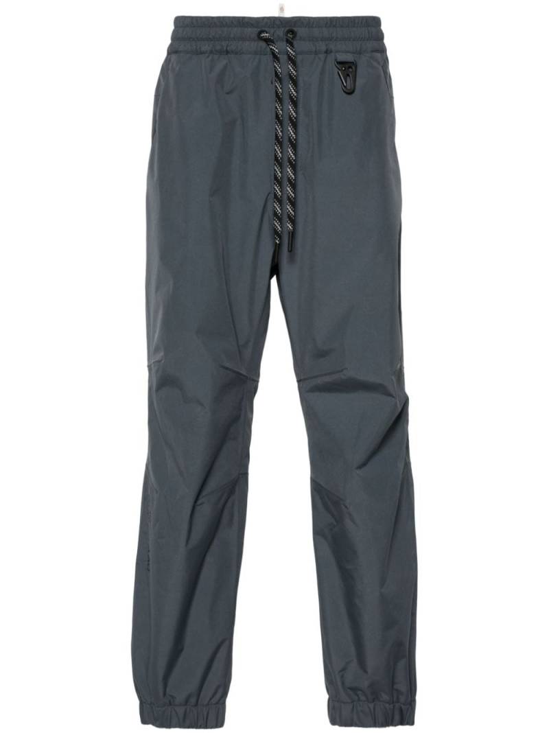 Moncler Grenoble logo-embossed track pants - Grey von Moncler Grenoble