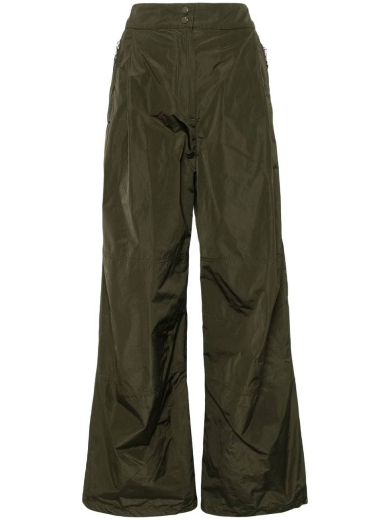 Moncler logo-appliqué flared trousers - Green von Moncler
