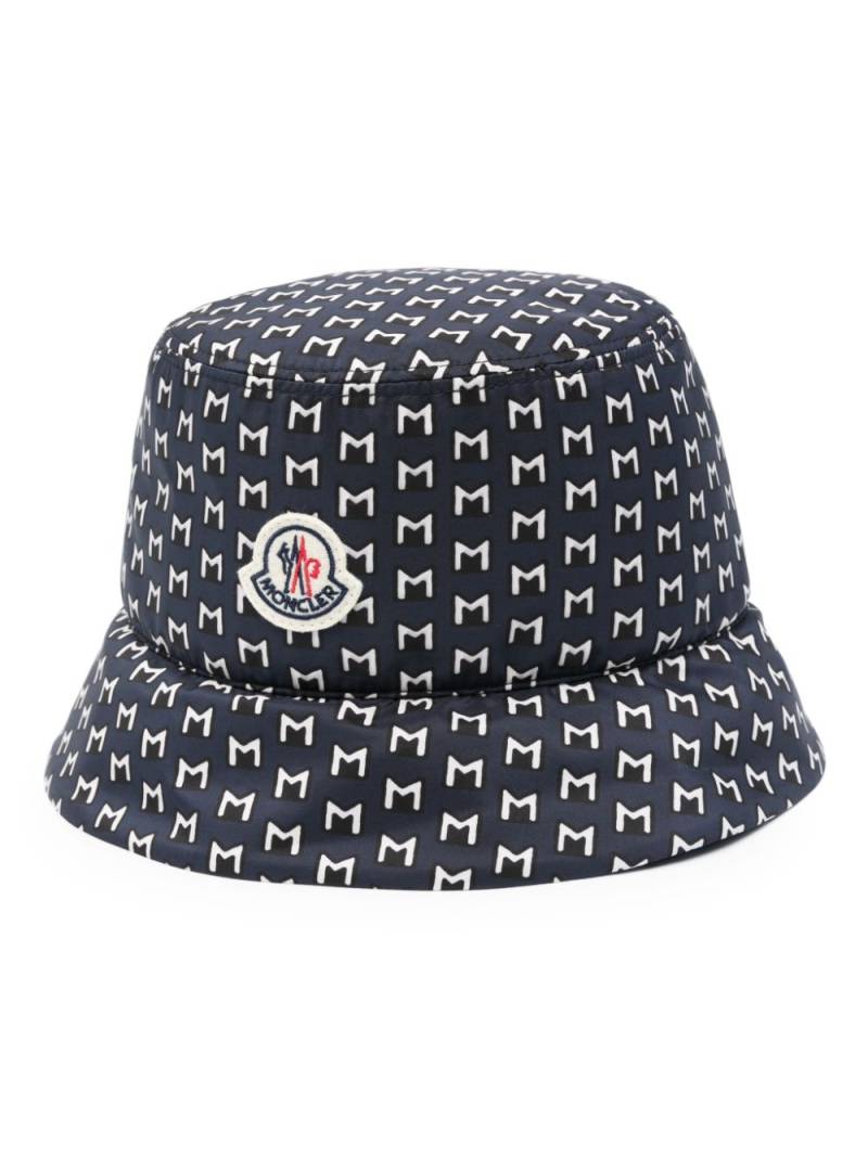 Moncler monogram-print bucket hat - Blue von Moncler