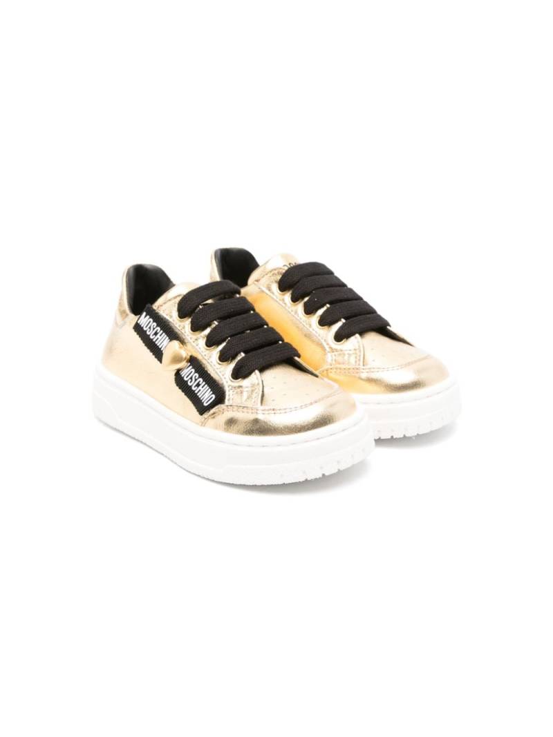 Moschino Kids bow-detail sneakers - Gold von Moschino Kids