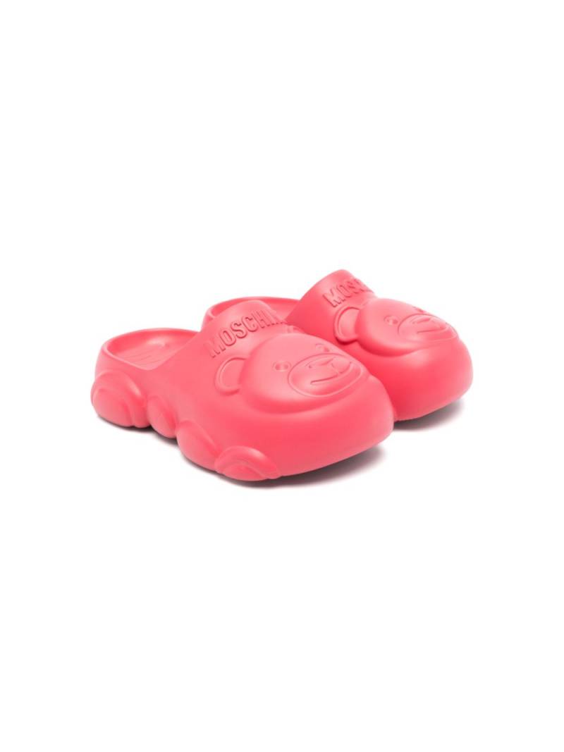 Moschino Kids embossed-logo slides - Pink von Moschino Kids