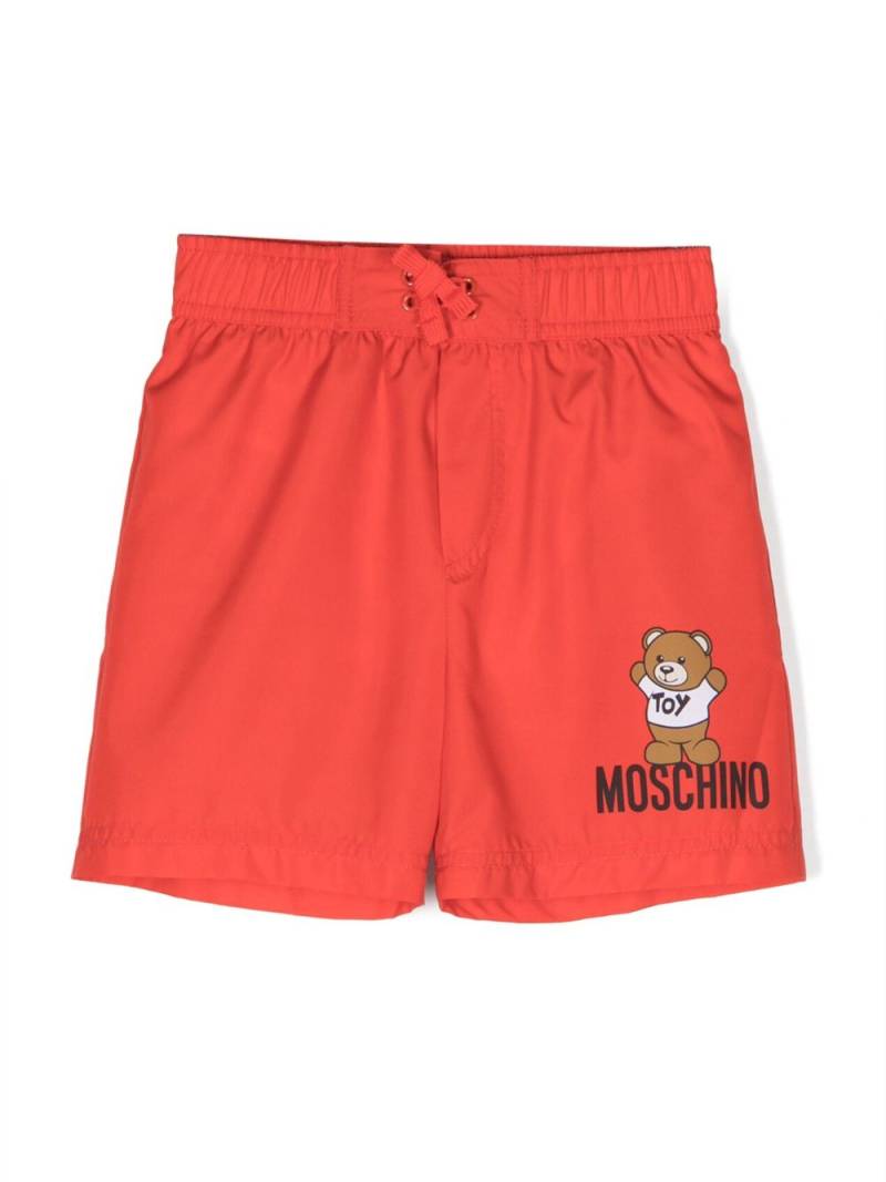 Moschino Kids logo-print swim trunks - Red von Moschino Kids