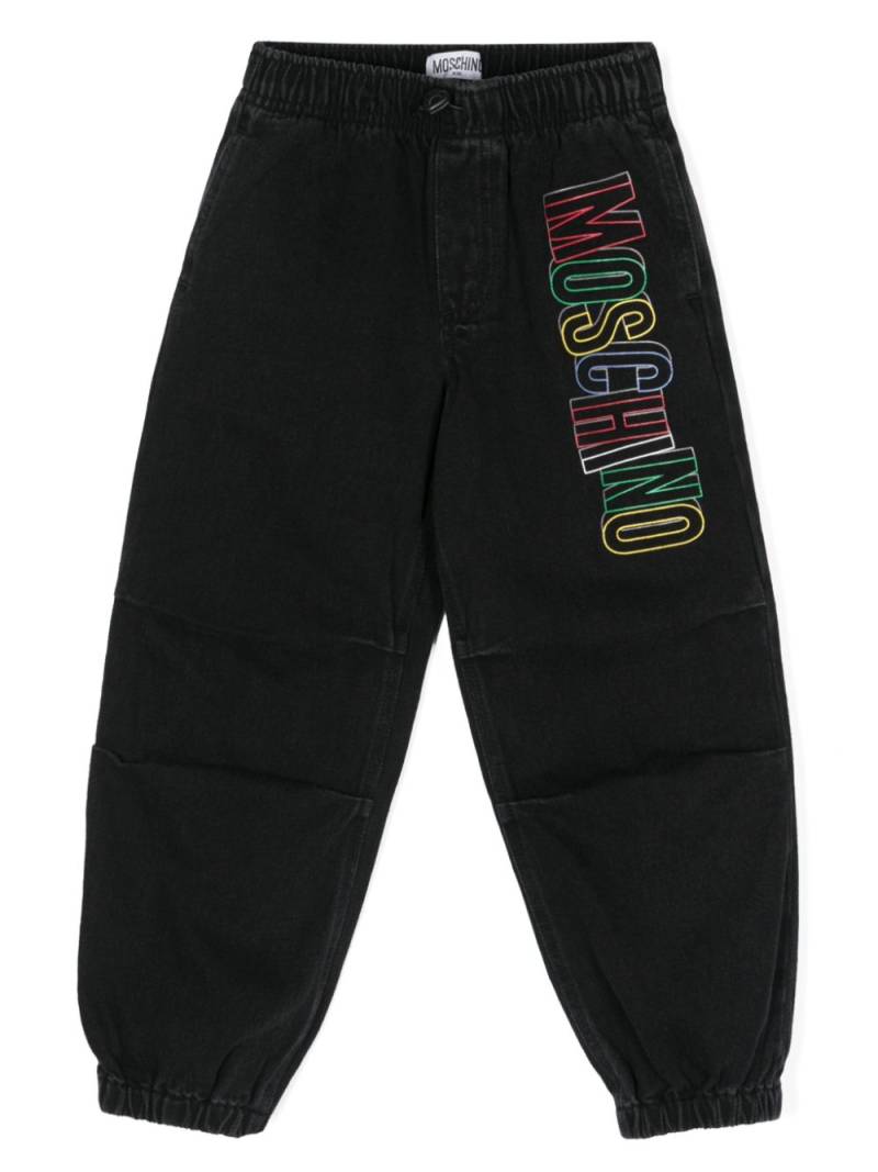 Moschino Kids logo-print tapered jeans - Black von Moschino Kids