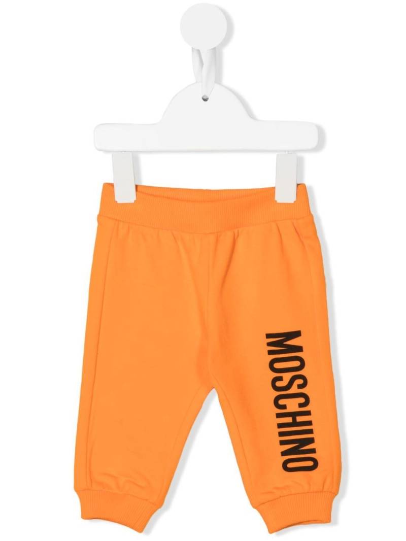 Moschino Kids logo-print tracksuit bottoms - Orange von Moschino Kids