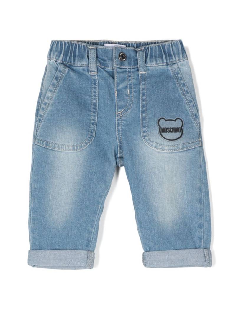 Moschino Kids teddy bear-motif jeans - Blue von Moschino Kids