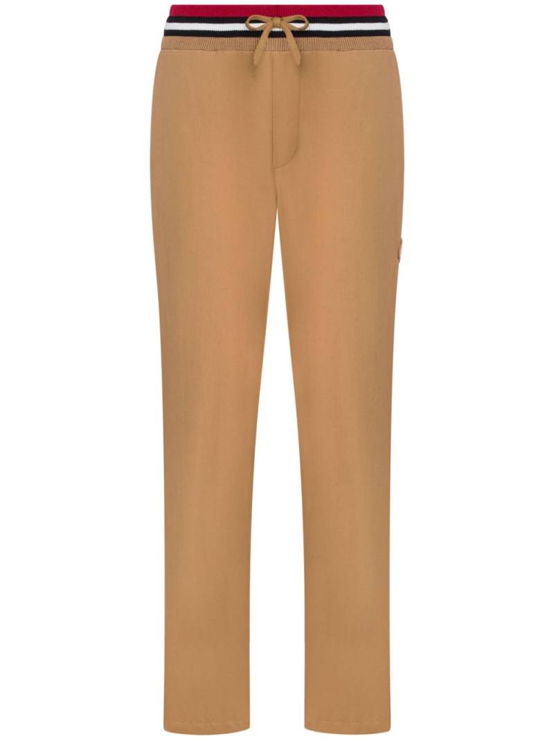 Moschino logo-appliqué straight-leg trousers - Brown von Moschino