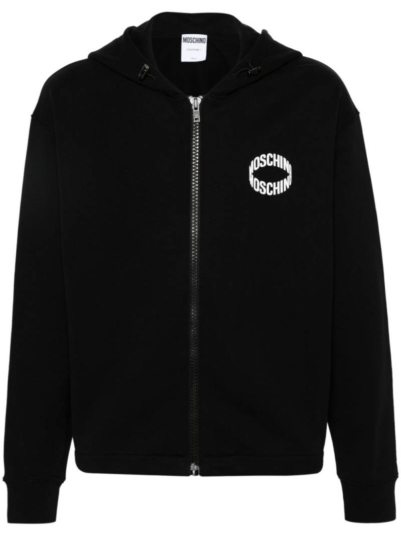 Moschino logo-appliqué zip-up hoodie - Black von Moschino