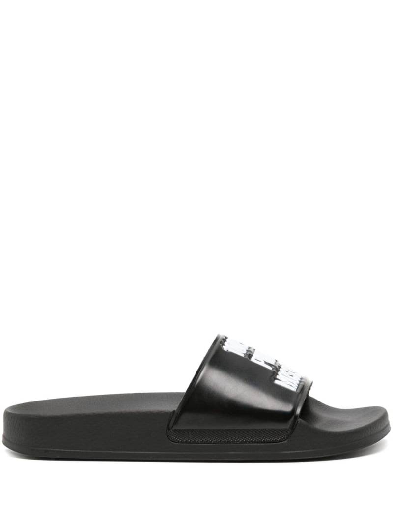 Moschino logo-embossed textured slides - Black von Moschino