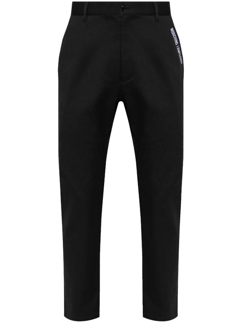 Moschino logo-embroidered trousers - Black von Moschino