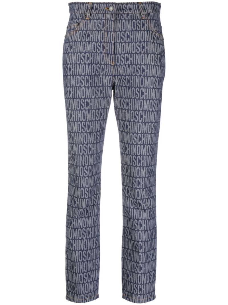 Moschino logo-jacquard high-rise slim-cut jeans - Blue von Moschino