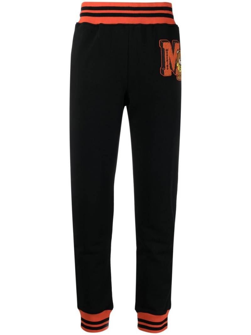 Moschino logo patch track pants - Black von Moschino