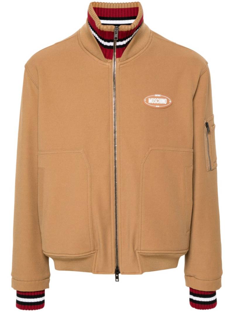 Moschino logo-patch twill bomber jacket - Brown von Moschino