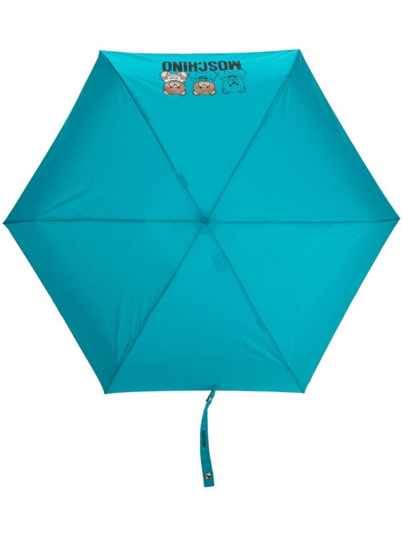 Moschino logo-print compact umbrella - Blue von Moschino