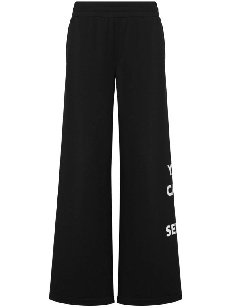 Moschino logo-print cotton trousers - Black von Moschino