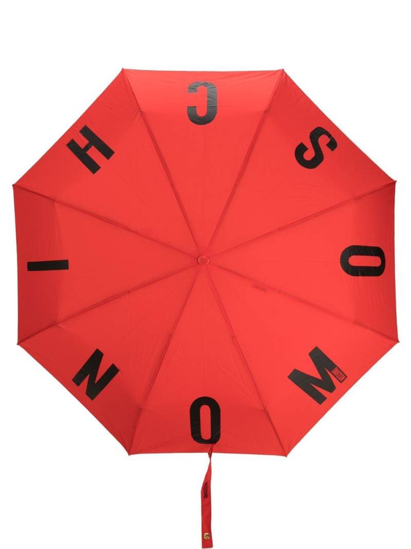 Moschino logo-print folded umbrella - Red von Moschino