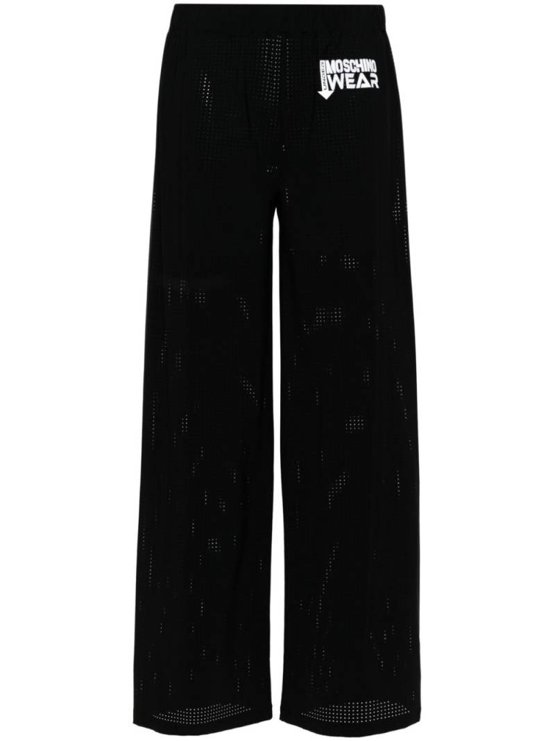 Moschino logo-print wide-leg trousers - Black von Moschino
