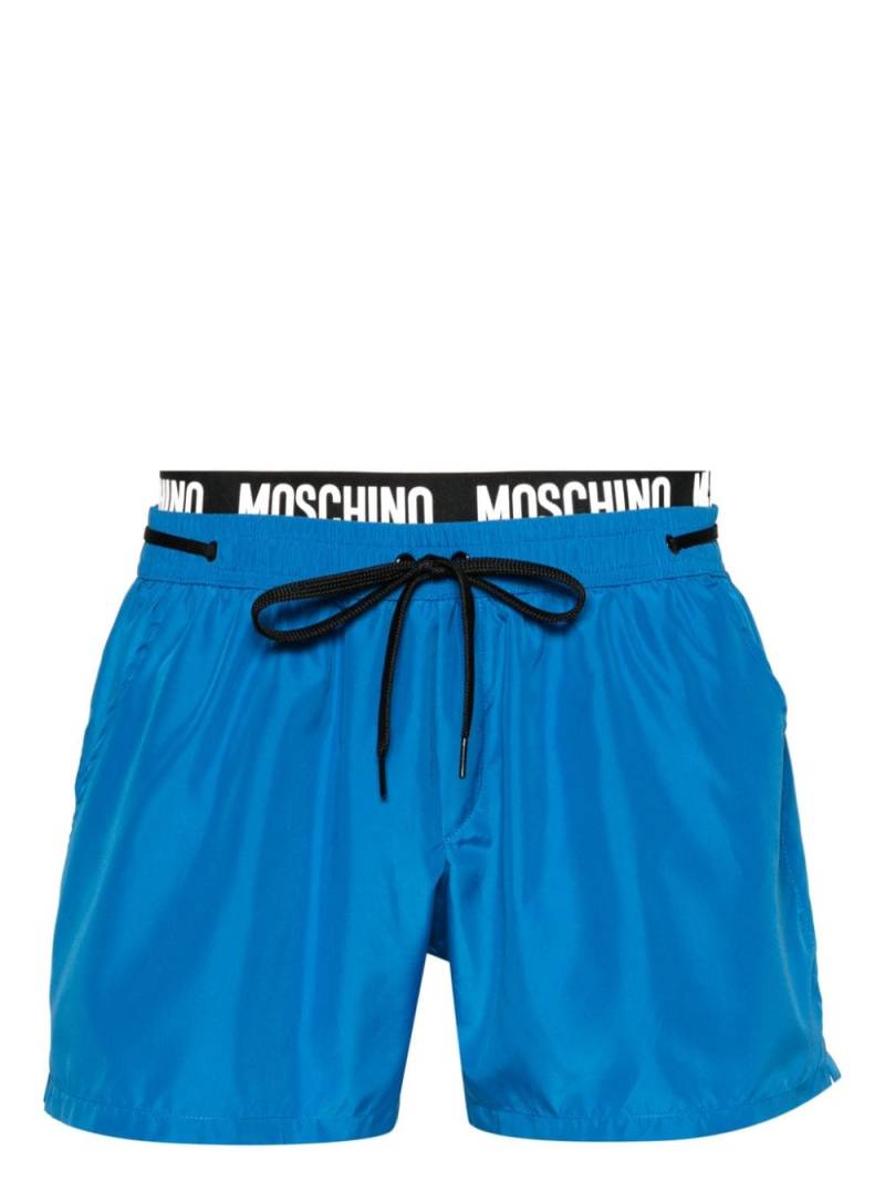 Moschino logo-waistband swim shorts - Blue von Moschino