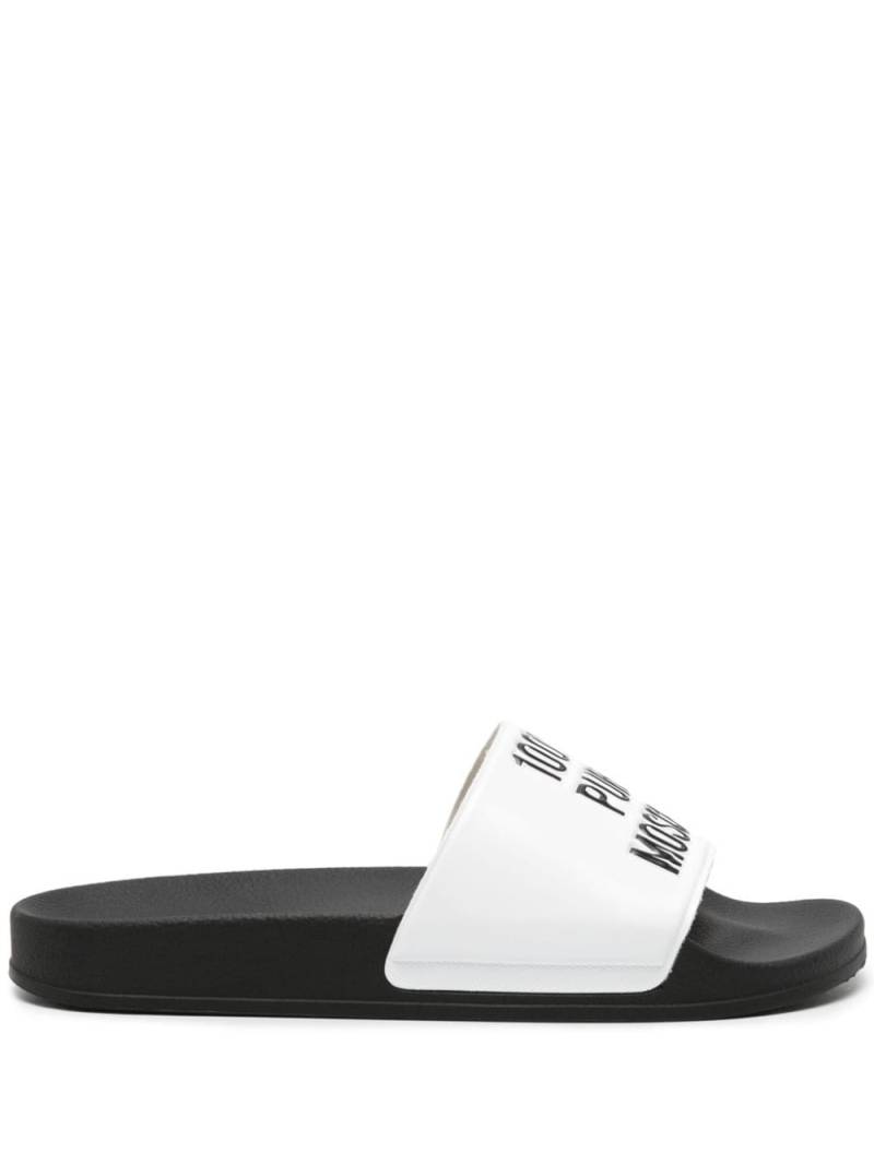 Moschino slogan-embossed slides - White von Moschino