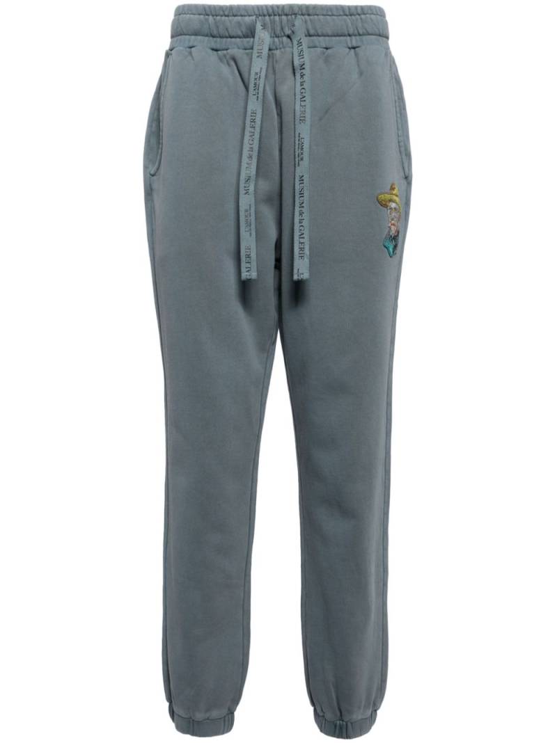 Musium Div. graphic-patch track pants - Blue von Musium Div.