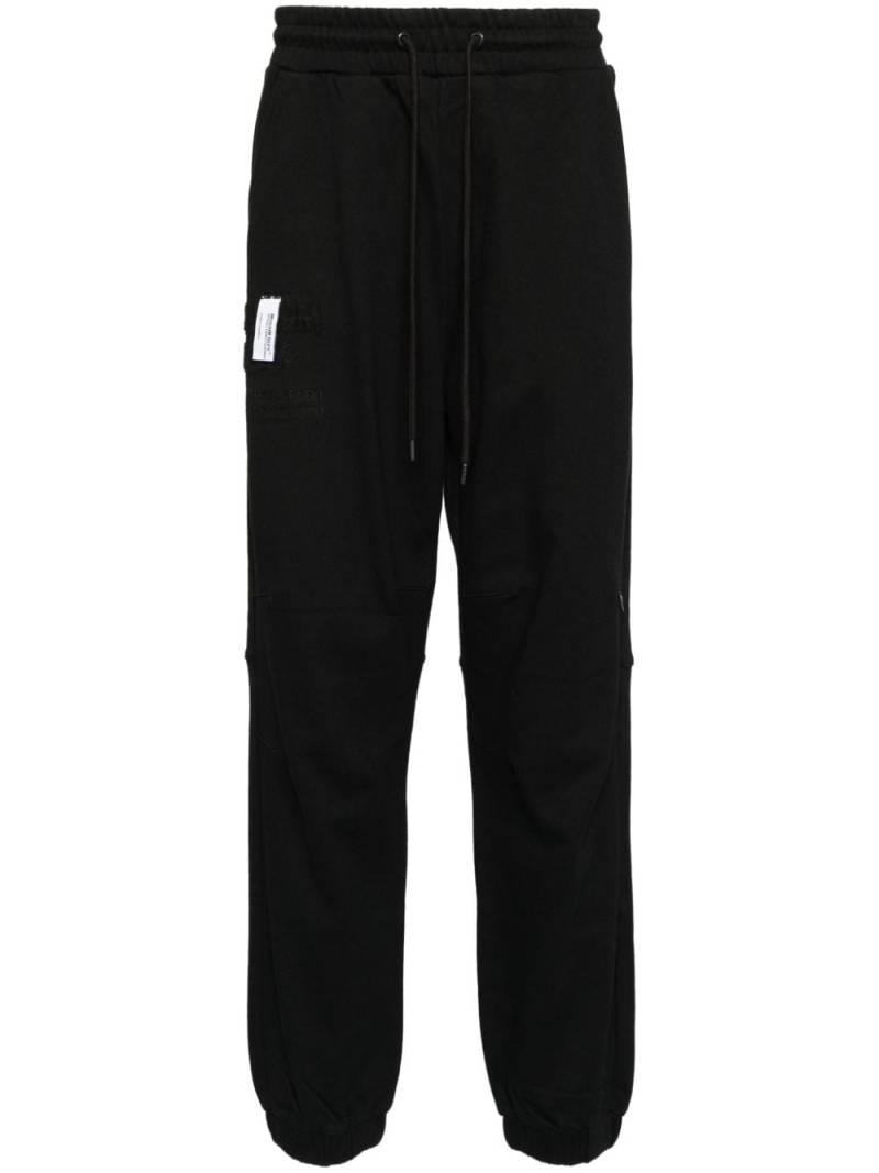 Musium Div. logo-patch track pants - Black von Musium Div.