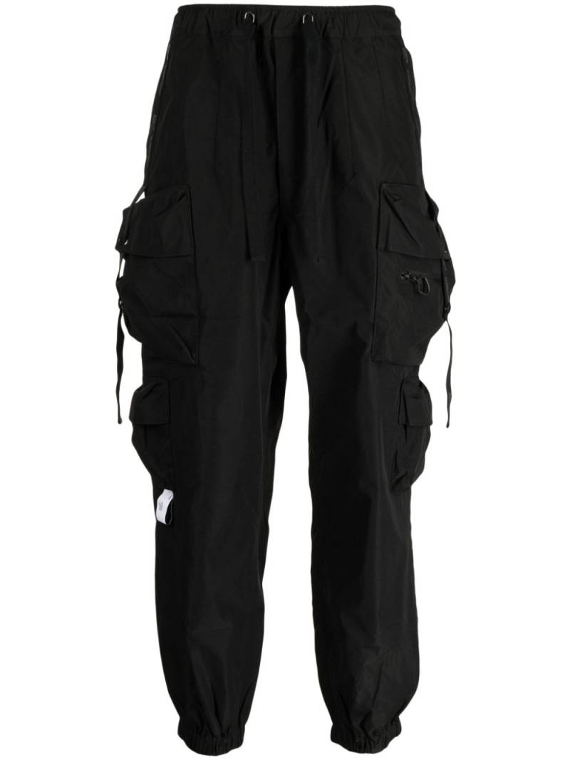 Musium Div. multiple-pocket drop-crotch trousers - Black von Musium Div.