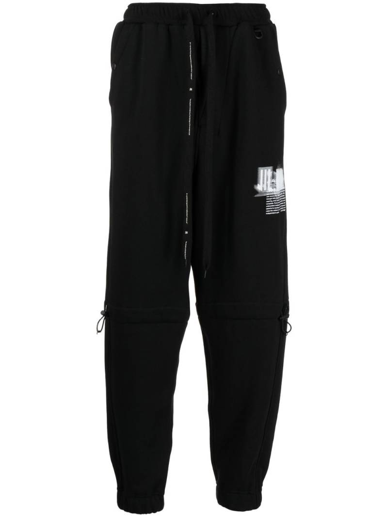 NILøS graphic-print track-pants - Black von NILøS