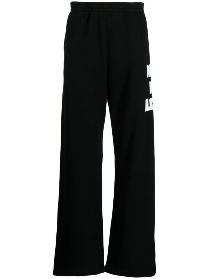 Natasha Zinko Heart text-print track pants - Black von Natasha Zinko