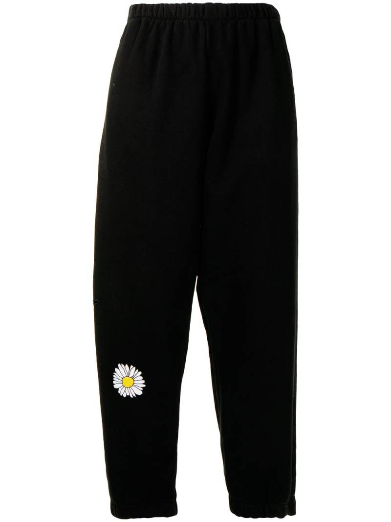 Natasha Zinko daisy-print cropped track pants - Black von Natasha Zinko