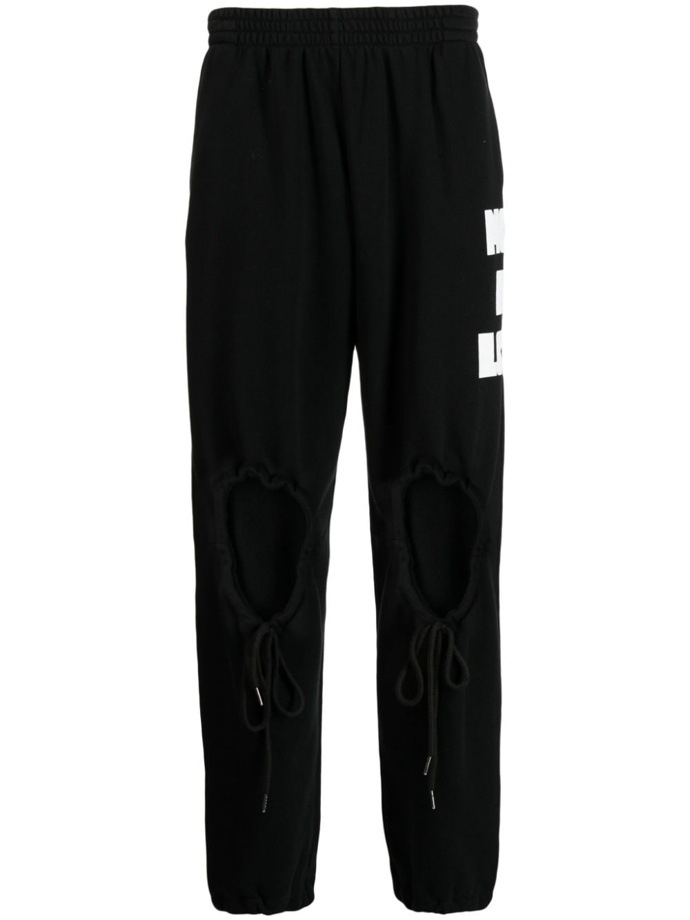 Natasha Zinko heart-shaped cut-out detail track pants - Black von Natasha Zinko