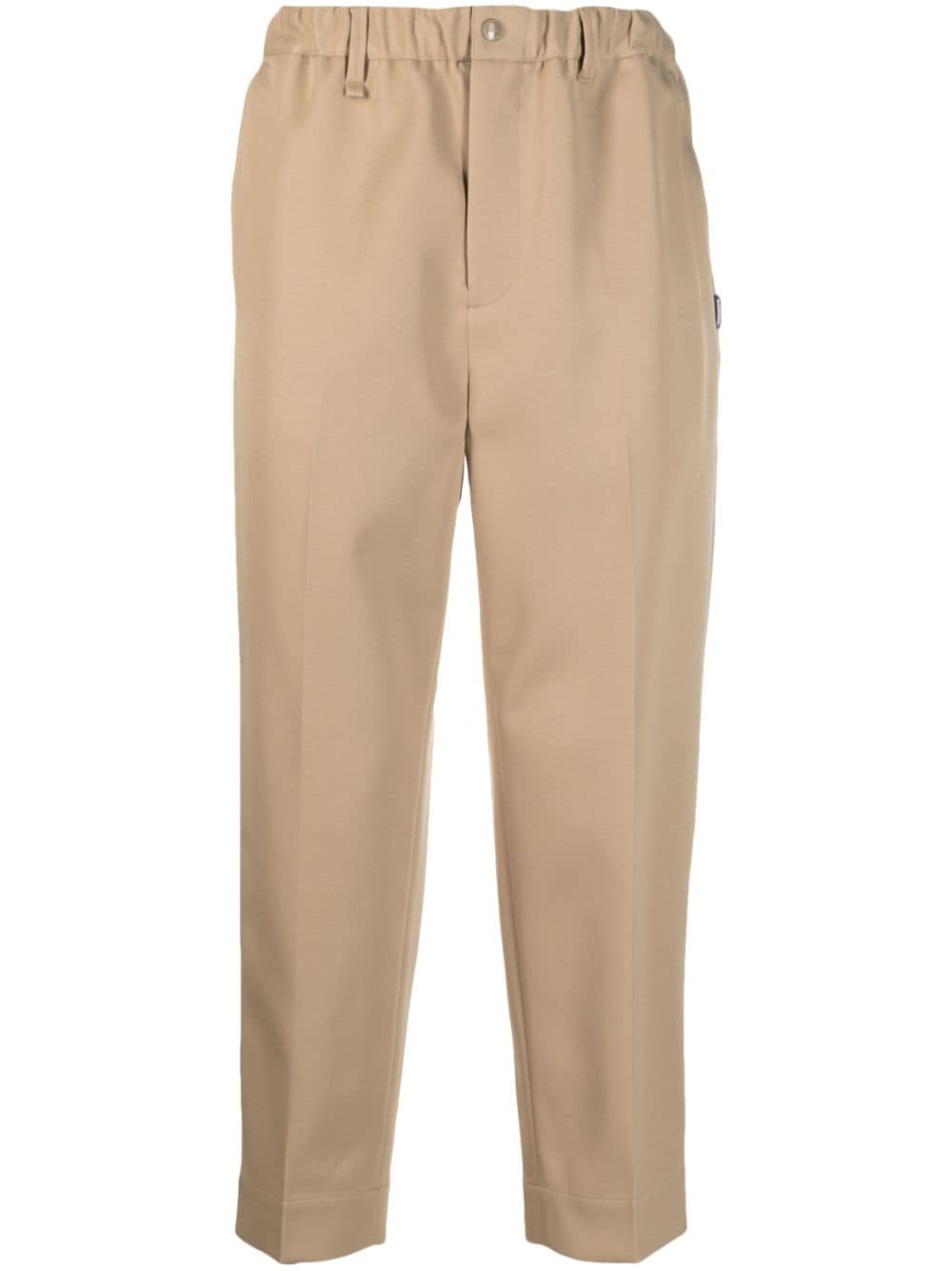 Neighborhood logo-patch tapered-leg trousers - Neutrals von Neighborhood