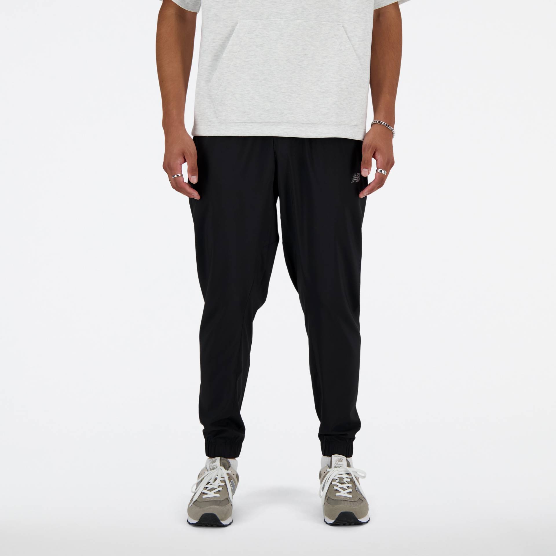 New Balance Trainingshose »SPORT ESSENTIALS WOVEN JOGGER« New Balance Trainingshose »SPORT ESSENTIALS WOVEN JOGGER« von New Balance