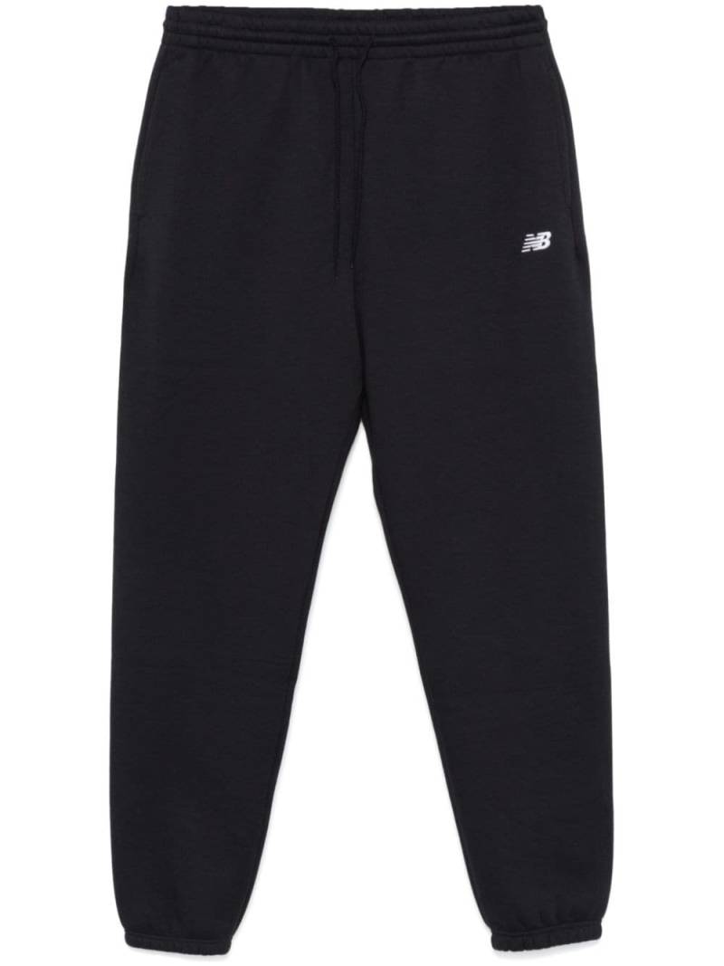 New Balance logo-embroidered track pants - Black von New Balance