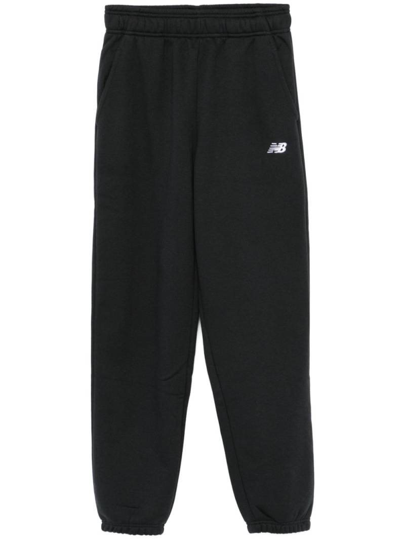 New Balance logo-embroidered track pants - Black von New Balance