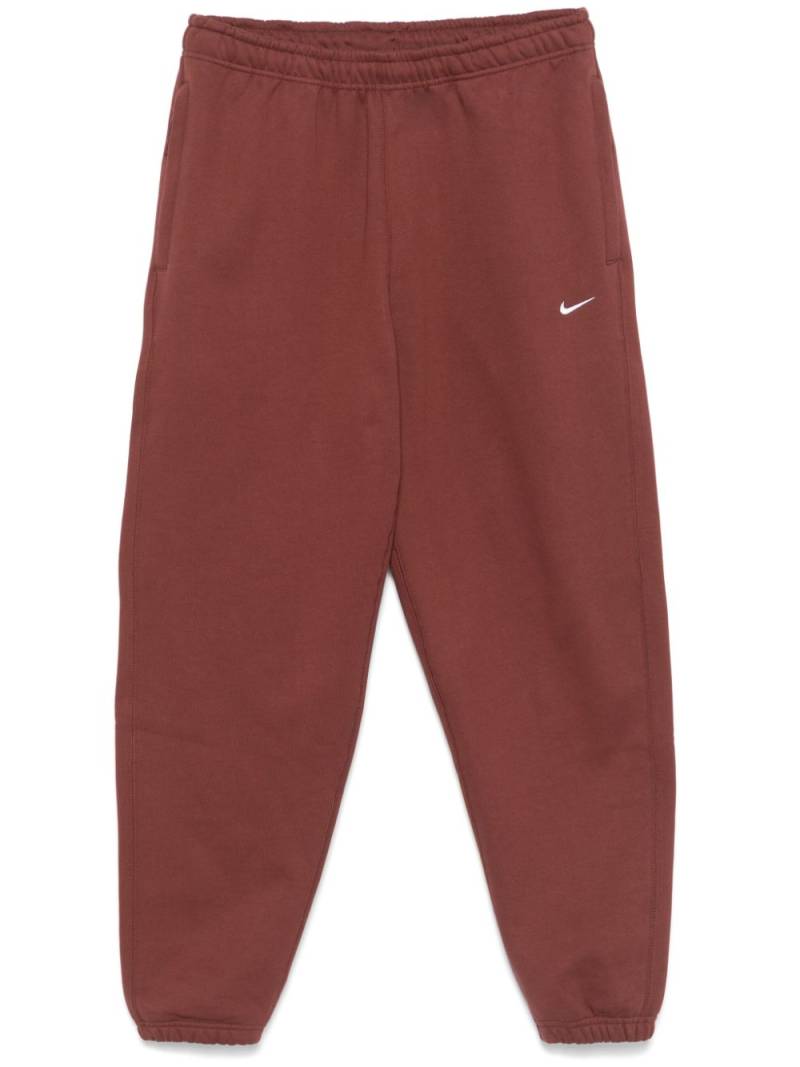 Nike Solo Swoosh track pants - Brown von Nike