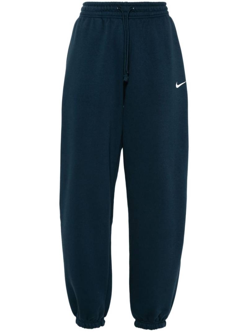 Nike high-waist track pants - Blue von Nike