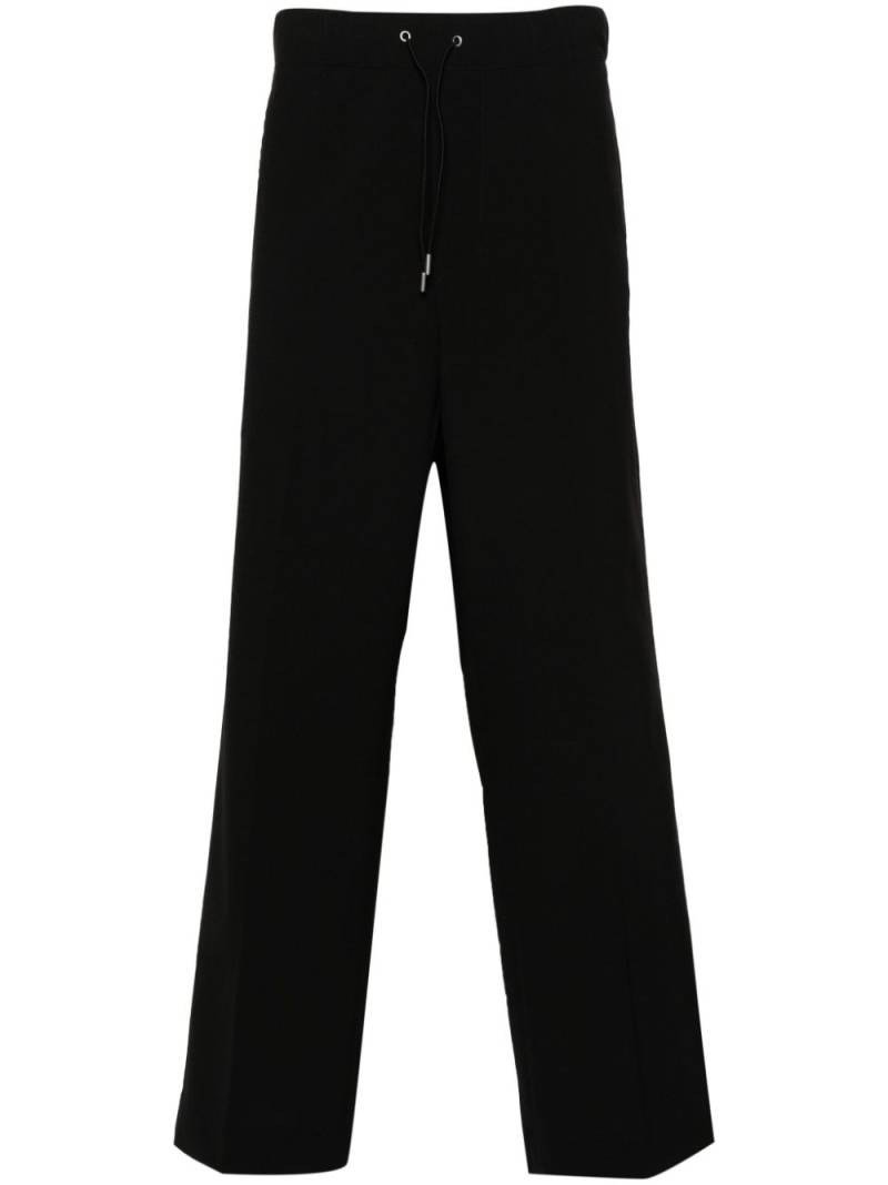 OAMC cropped wide-leg trousers - Black von OAMC