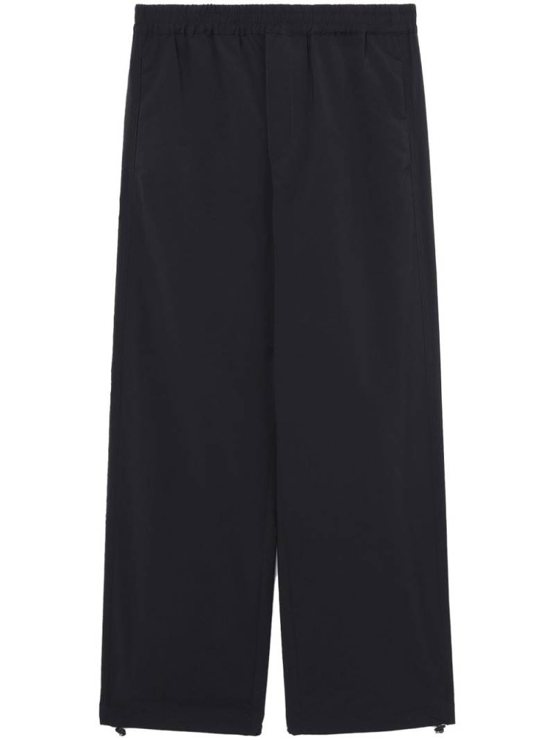 OAMC elasticated-waist straight-leg trousers - Black von OAMC