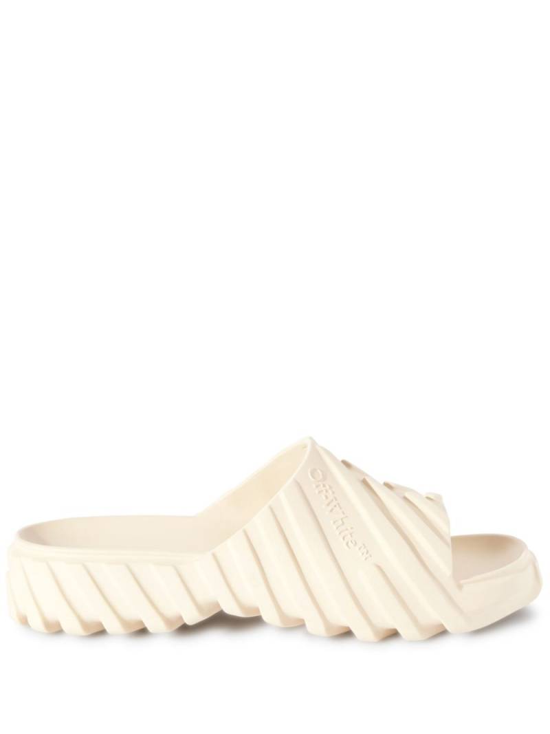 Off-White Exploration embossed slides - Neutrals von Off-White