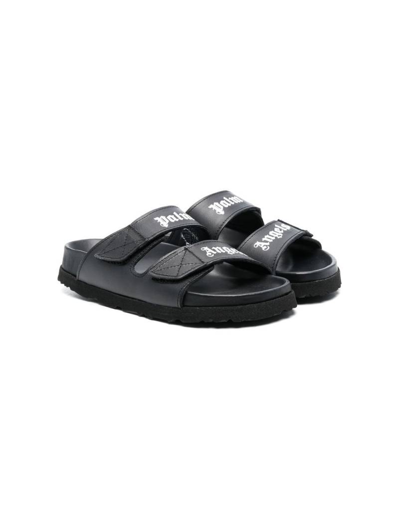 Palm Angels Kids logo-print leather slides - Black von Palm Angels Kids