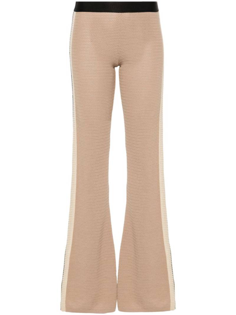 Palm Angels logo-tape knitted flared trousers - Brown von Palm Angels