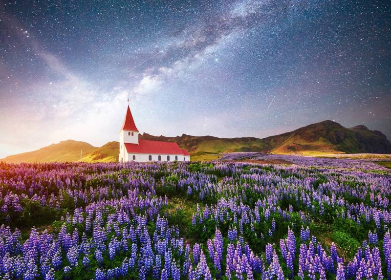 Papermoon Fototapete »BLUMEN-WIESE-FELD ISLAND KIRCHE STERNE HIMMEL BERGE« von Papermoon