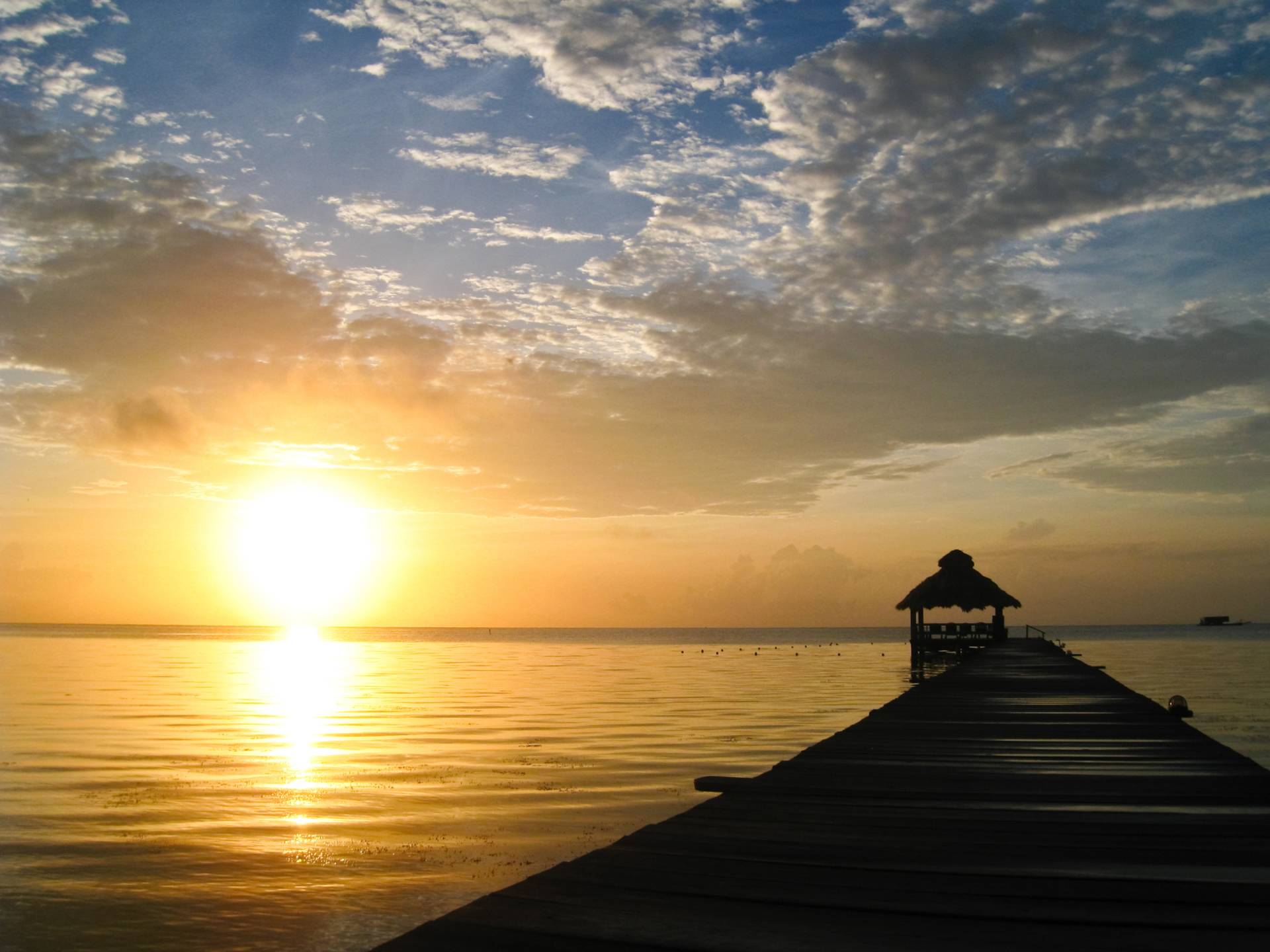 Papermoon Fototapete »Sunburst over Belize« von Papermoon