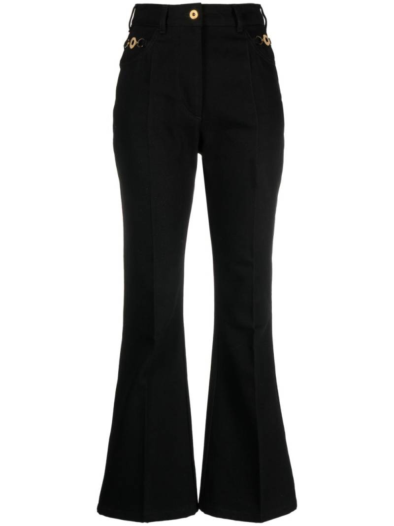 Patou logo-embroidered flared jeans - Black von Patou