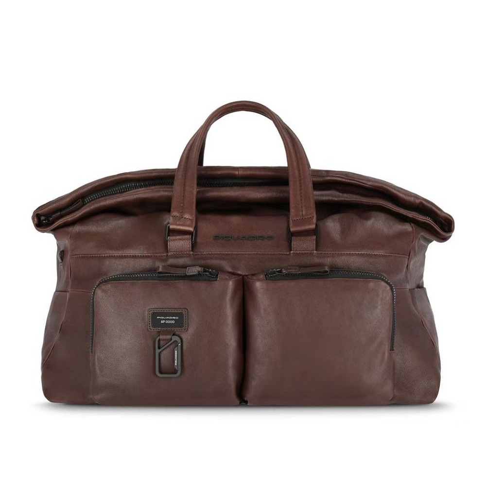 Harper - Reisetasche mit Trolley-Schlaufe in dunkelbraun Harper - Reisetasche mit Trolley-Schlaufe in dunkelbraun von Piquadro