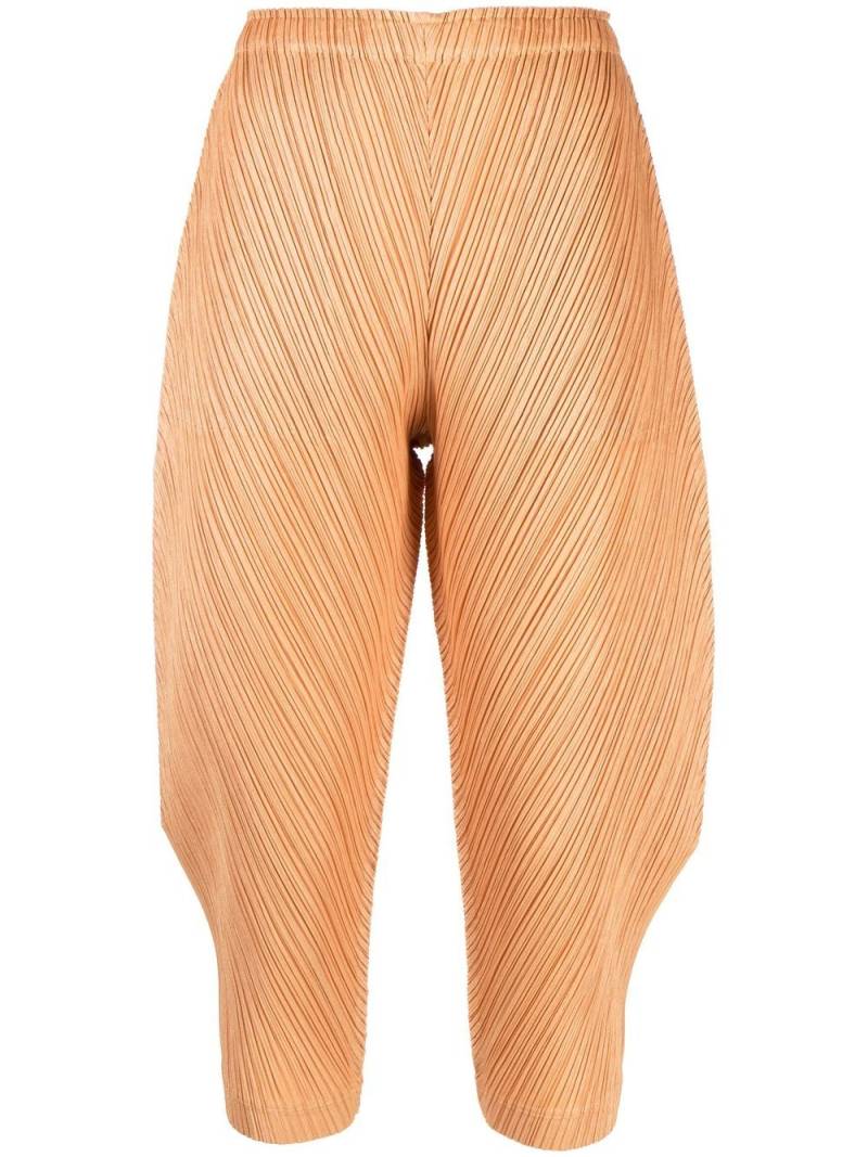 Pleats Please Issey Miyake crease-effect trousers - Orange von Pleats Please Issey Miyake