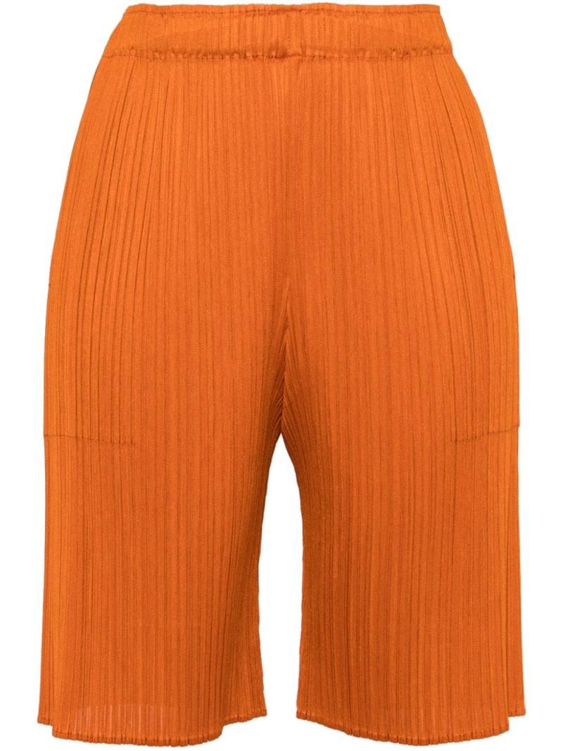 Pleats Please Issey Miyake knee-length pleated shorts - Orange von Pleats Please Issey Miyake