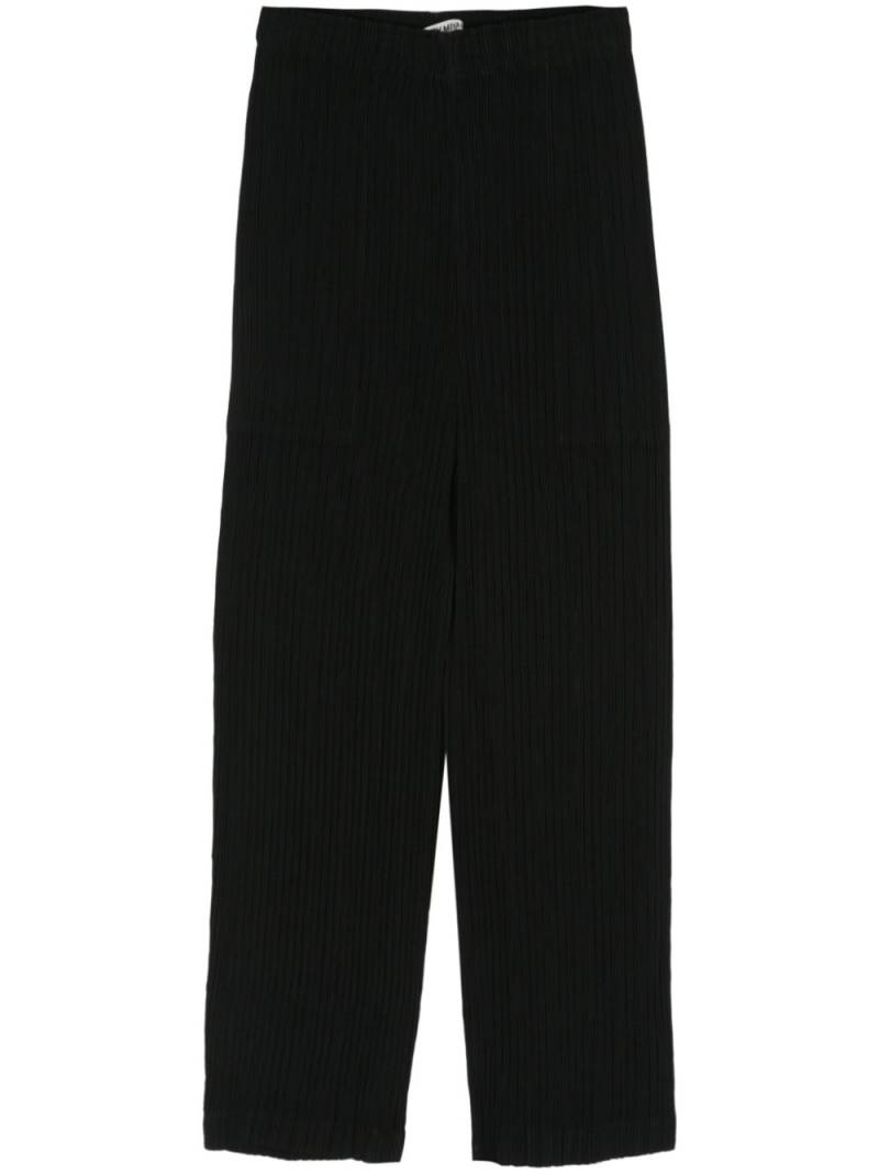 Pleats Please Issey Miyake pleated cropped trousers - Black von Pleats Please Issey Miyake