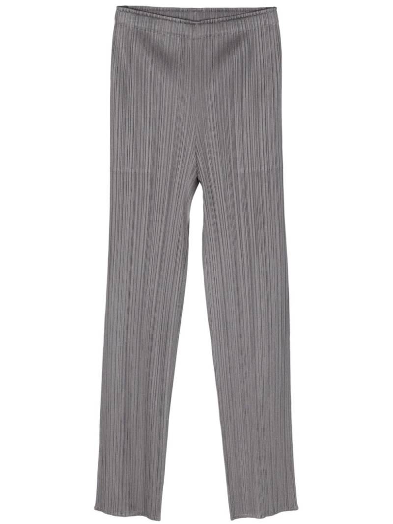 Pleats Please Issey Miyake plissé satin trousers - Grey von Pleats Please Issey Miyake