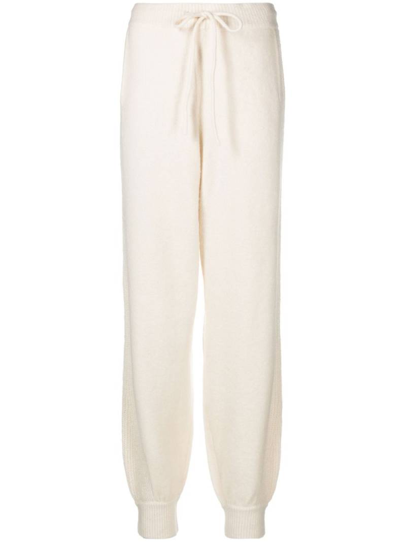 REMAIN tapered-leg knitted trousers - Neutrals von REMAIN